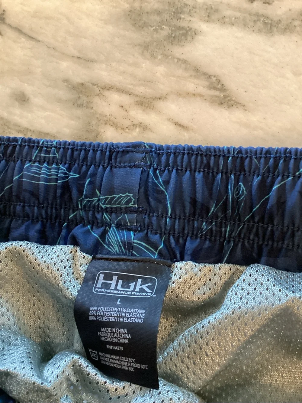 Huk Navy Swim Trunks with Aqua Marlin Print